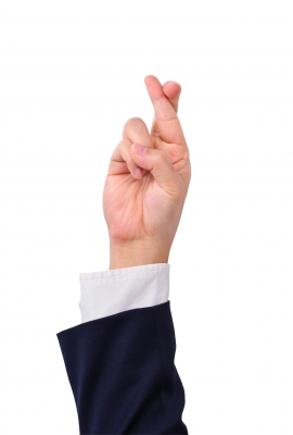 Business Man Finger Crossed Hand Sign By Teerapun